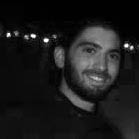 a man standing with his hands in his pockets