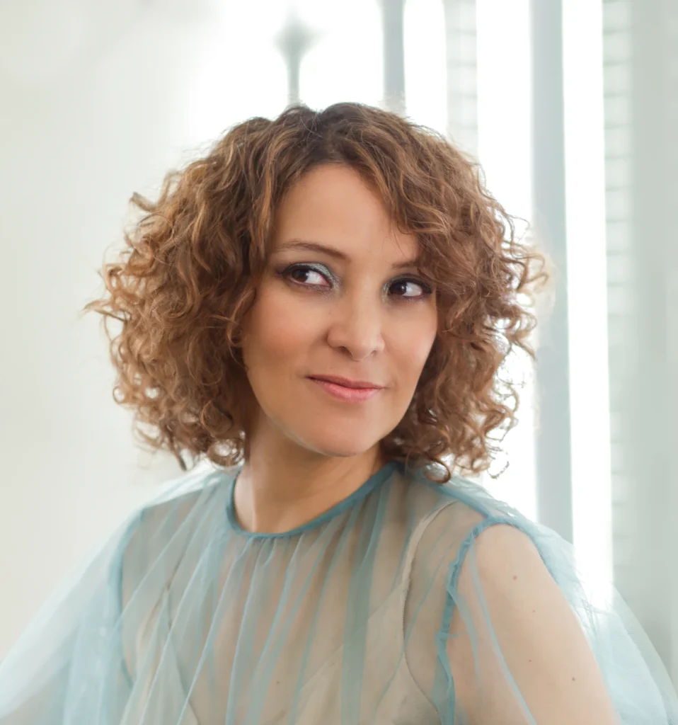 a close up of a person wearing a dress